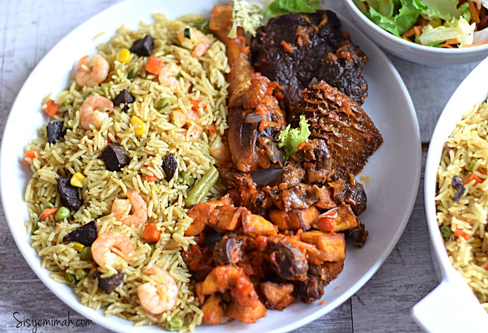 Basmati Fried Rice served with protein of your choice, plantain and coleslaw